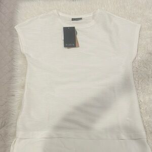 White dressy top . Size XS